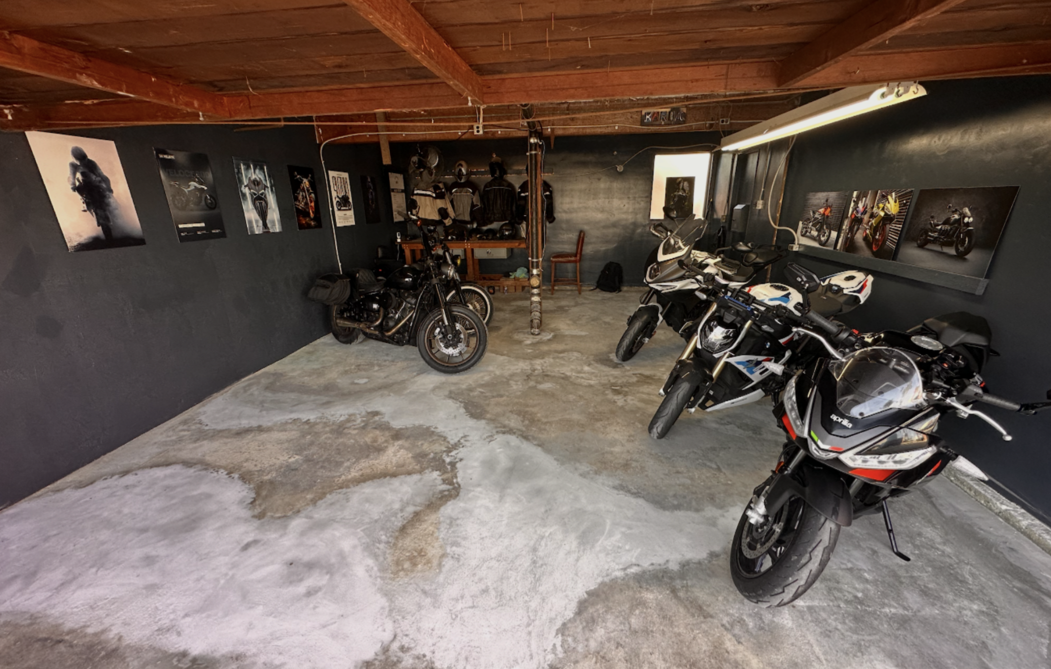 Interior view of Moto Venice secure motorcycle storage garage showing multiple bikes in a clean, organized facility